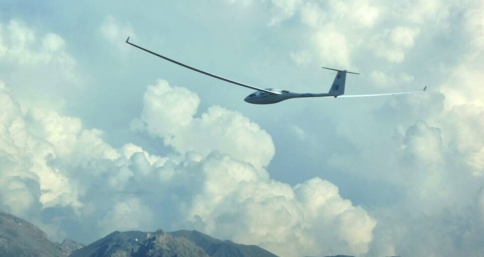 glider and clouds