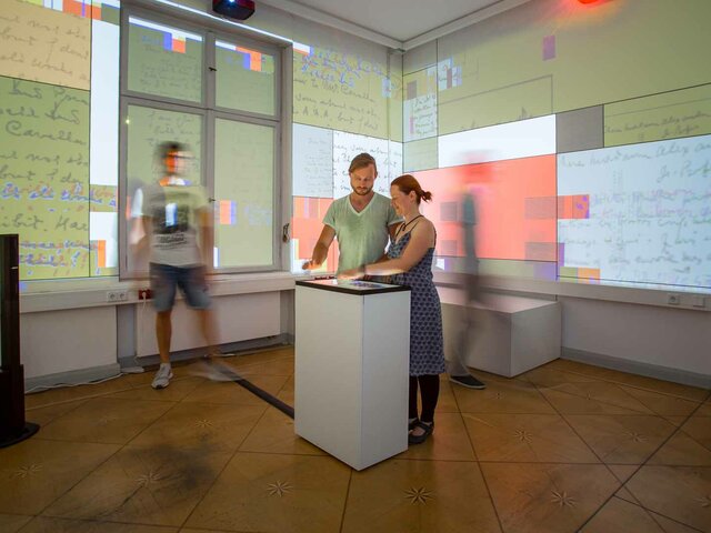 man and woman in the middle of of the projection