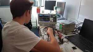 Boy working in robotics lab