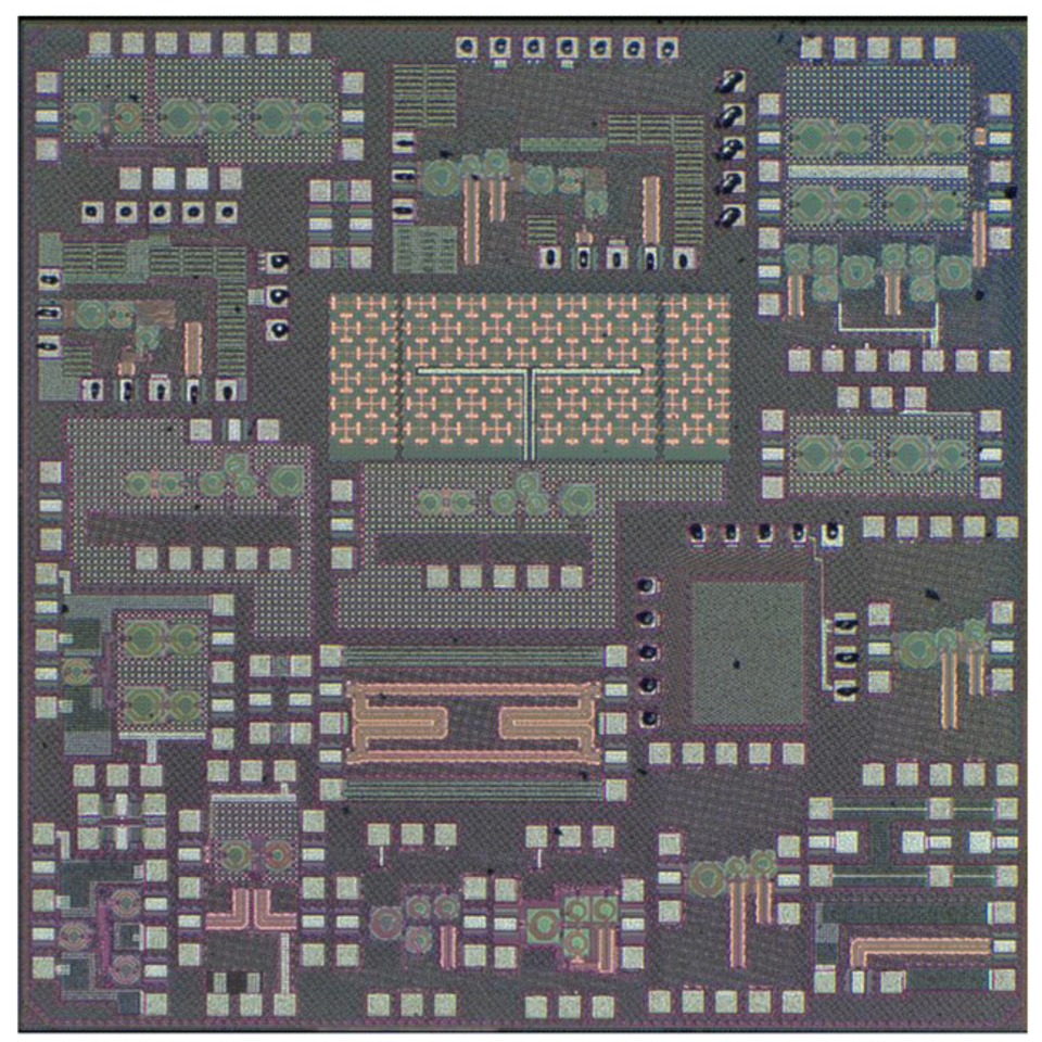 Close-up of a microchip circuit layout showing various interconnected components and pathways