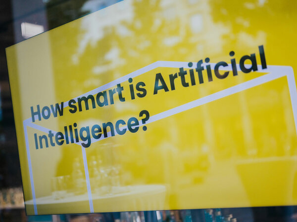 A monitor on which is written “How smart is Artificial Intelligence?”.